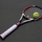 Tennis racket and ball